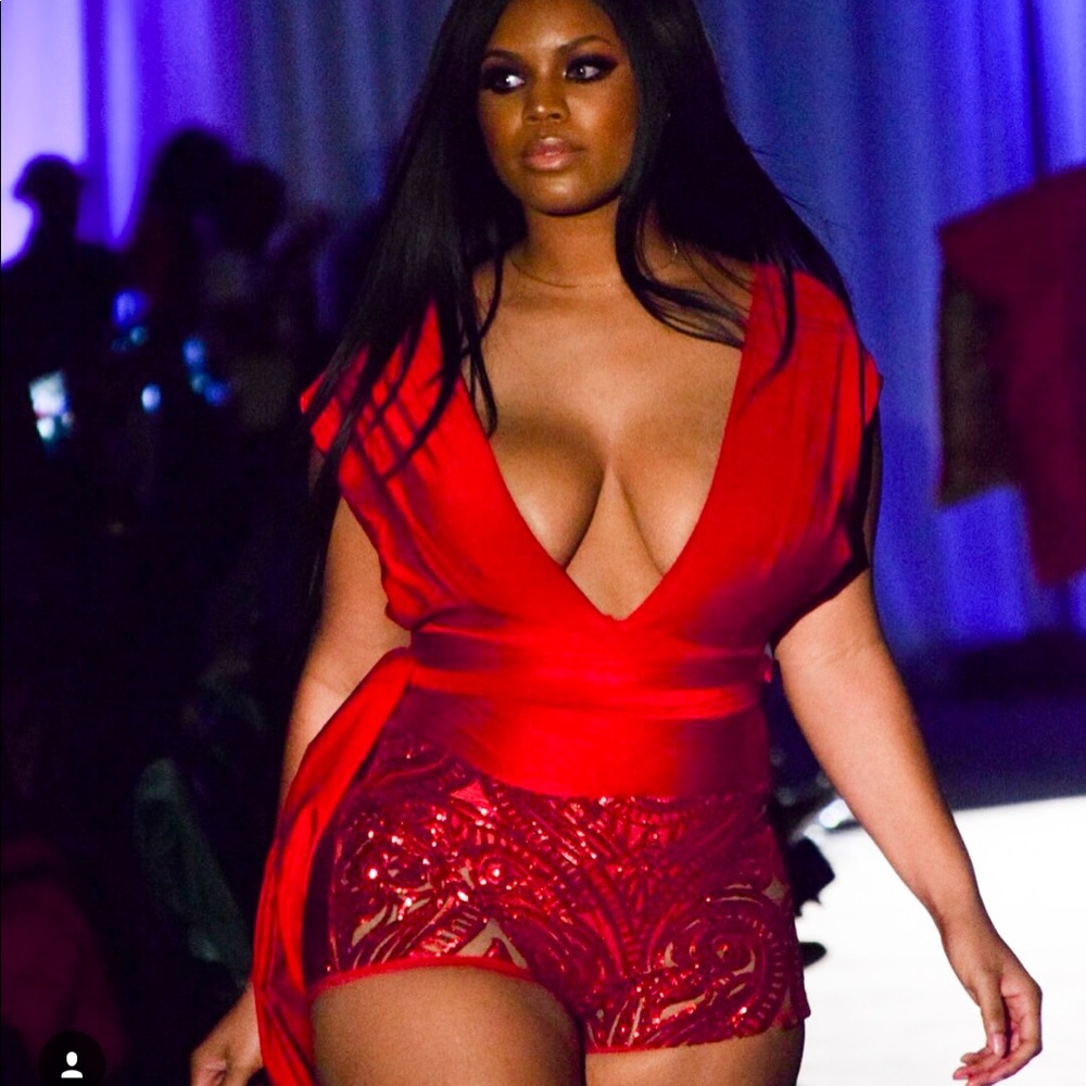 Red spandex leotard and sequin shorts